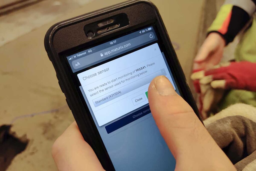 Phone held in hand, showing the data from the Orbit 3 sensor